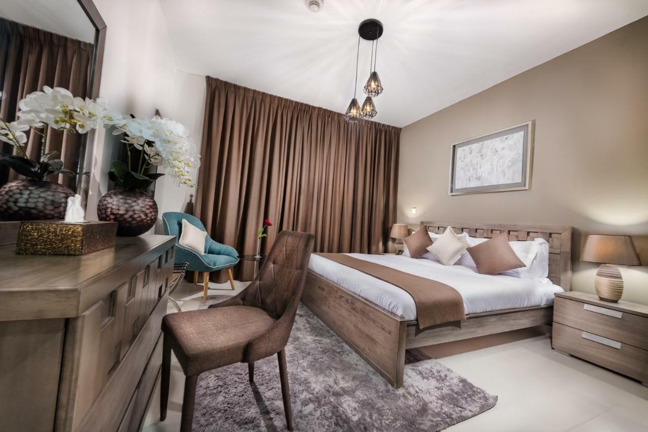דובאי Oskena Vacation Homes -The Lofts Boulevard Downtown מראה חיצוני תמונה